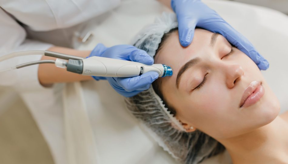 Closeup portrait of beautiful woman during cosmetology therapy in beauty salon. Professional dermatology procedures, lifting, rejuvenation, modern devices, healthcare